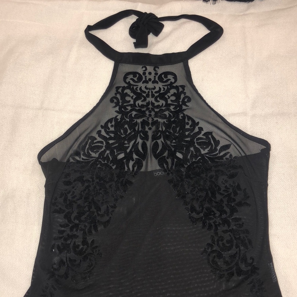 Black mesh bodysuit.